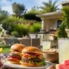 ellow-jackets-hovering-around-burgers-fruit-lemonade-and-watermelon-at-a-summer-outdoor-meal-website